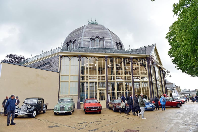 Cars lined up for viewing along the promenade for the H&H classic car auction
