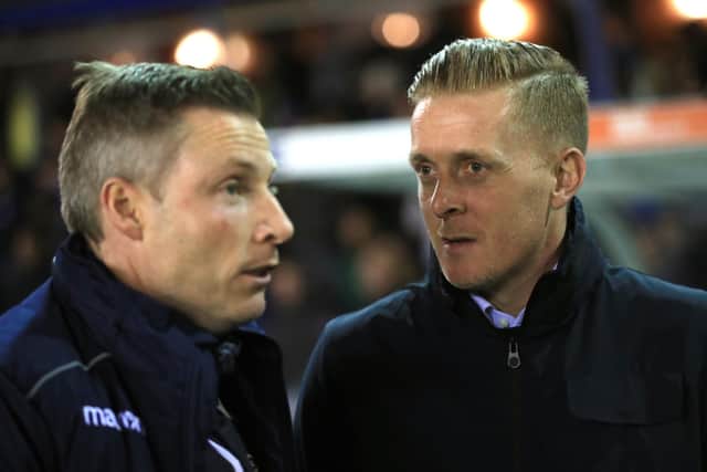 Neil Harris and Garry Monk will be going head to head when Cardiff City welcome Sheffield Wednesday at the Cardiff City Stadium on Saturday. Photo: Simon Cooper/PA Wire.