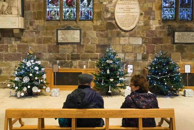 The interior of Sheffield Cathedral has also been decorated with 30 Christmas trees for Festival of Light ticketholders to come in and enjoy after the show