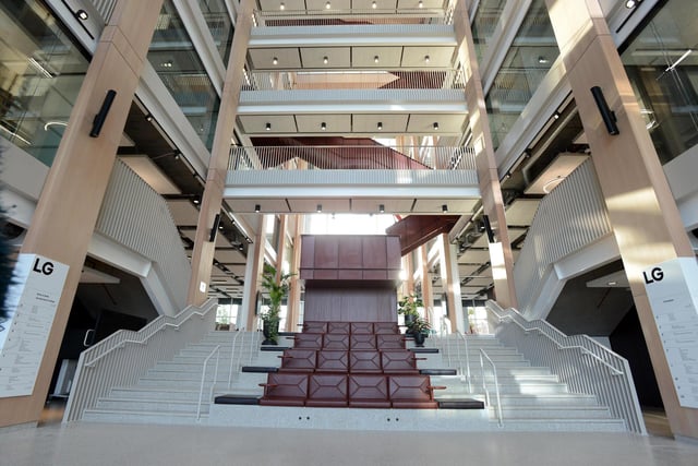 Offices and meeting rooms surround a stunning central atrium.