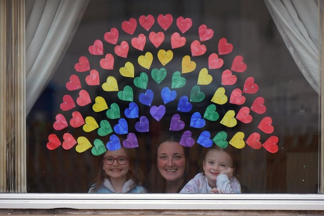 Elise Lightbody 7 and Rhianne Lightbody 4 with a little help from mum Kirsty Lynch painted a rainbow on their window in Bantaskine to spread a little joy.
