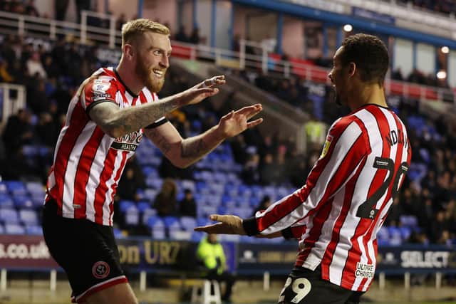 Oli McBurnie and lliman Ndiaye of Sheffield United celebrate Ndiaye's goal at Reading: Paul Terry / Sportimage