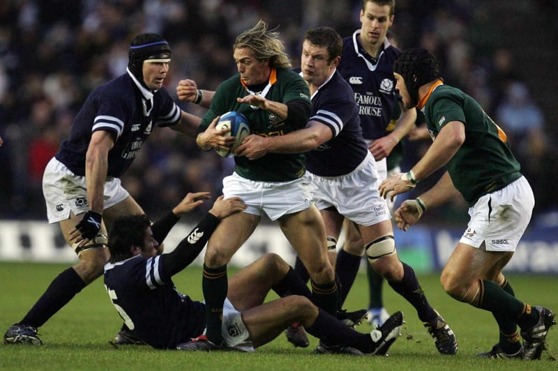 Scotland 10, South Africa 45: November 27, 2004, autumn international
South Africa's Percy Montgomery being tackled by Scotland's Hugo Southwell and Jason White at Murrayfield Stadium in Edinburgh (Photo: Ian Stewart/AFP via Getty Images)