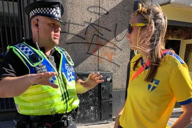 The force posted pictures of officers chatting to fans in yellow and orange shirts in the city centre.