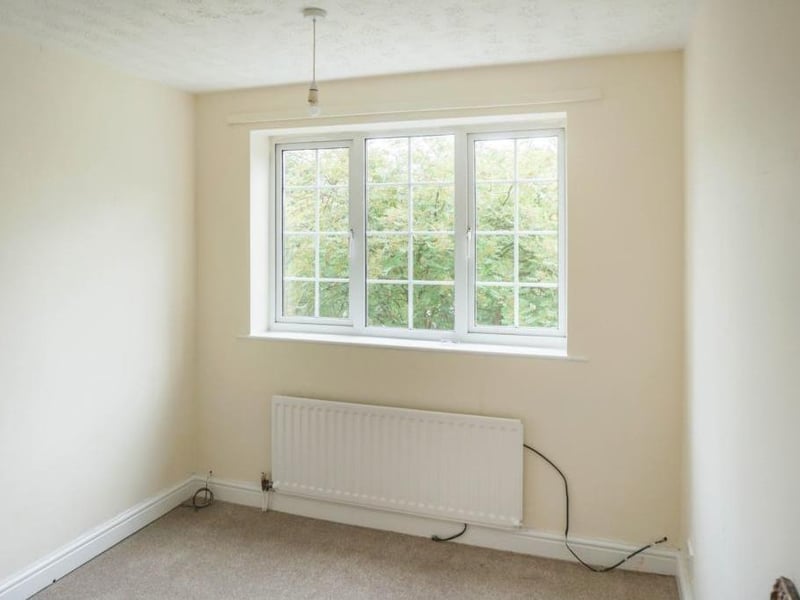 Bedroom three - Front facing neutrally decorated bedroom with upvc double glazing and central heating radiator