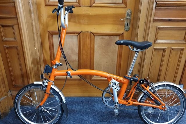 If this orange bike is yours and was stolen, the police would like to hear from you.