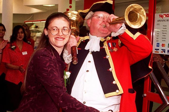 The new TK Maxx opens at Orchard Square in September 1997 - pictured is store manager Sarah Ellis and Town Crier Alan Myatt