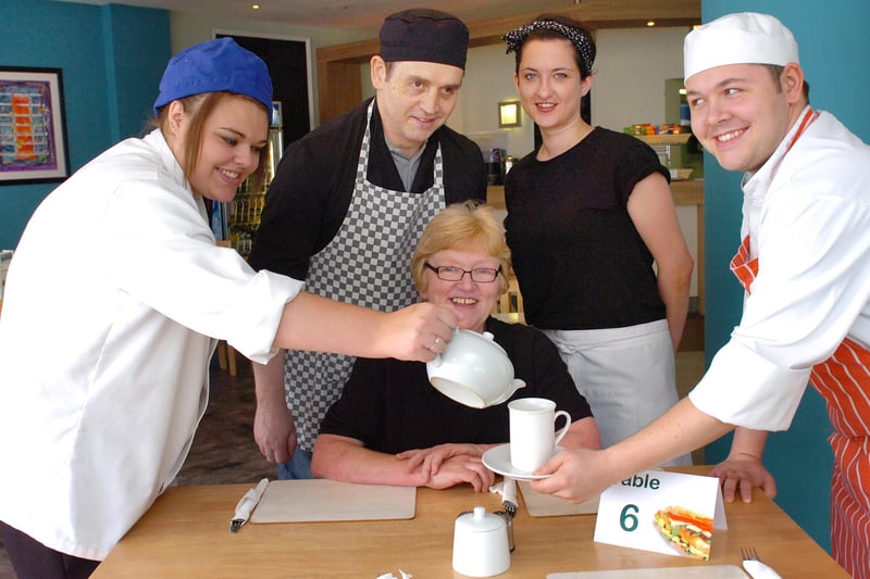 Cafe One77 on York Road was awarded a five-star food hygiene rating in 2012. Pictured pouring a cup of tea for cafe boss Anne Bell are, from left, Jamie Short, Paul Messer, Dawn Jones and Jamie Price.