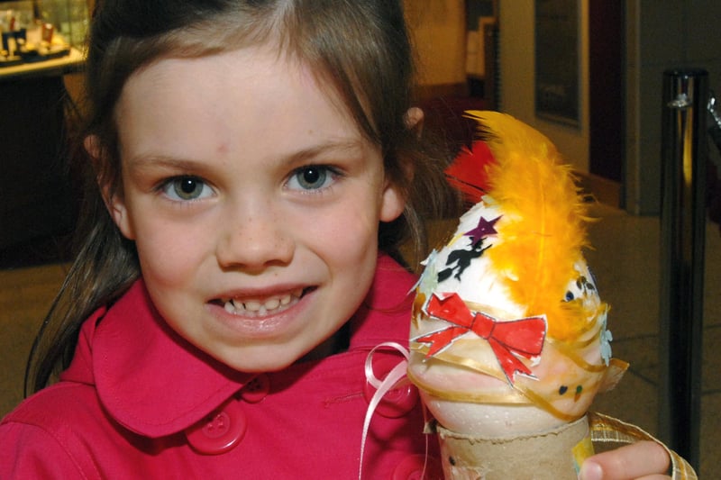 Mia Richardson shows off her Easter egg which she made during the Four Seasons' Easter Fun Week in 2009.