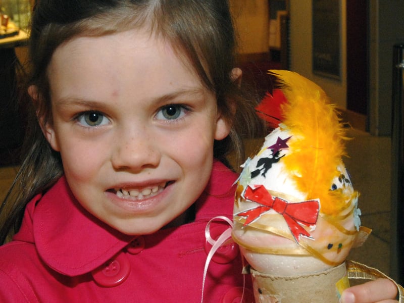 Mia Richardson shows off her Easter egg which she made during the Four Seasons' Easter Fun Week in 2009.