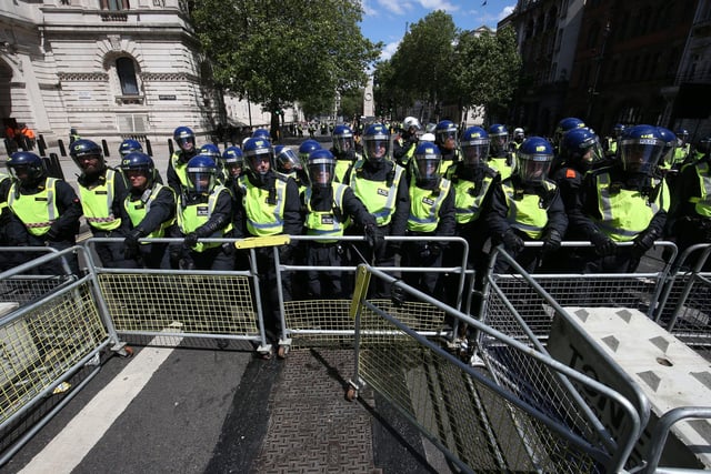 Police form a barricade in Parliament Square. Picture: Jonathan Brady/PA Wire