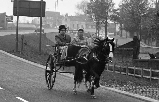 Do you recognise this couple, two of the first residents to use the new road?