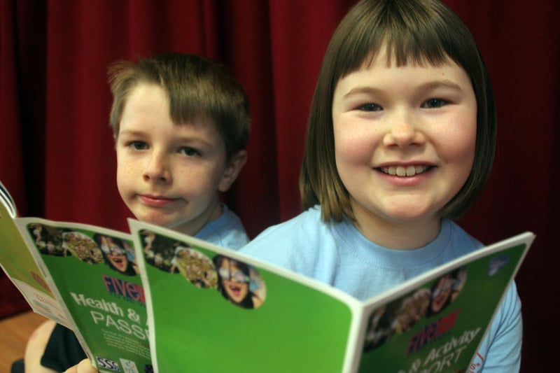 Brockley junior school pupils Ben Roberts and Katie Webb with their wellness passports.
