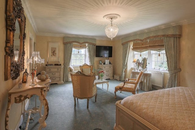 This is one of the many bedrooms that this house holds - most of the bedrooms are themed in a Scots and French style