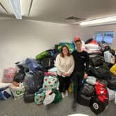 The mountain of donations shows the huge pent up desire to help.