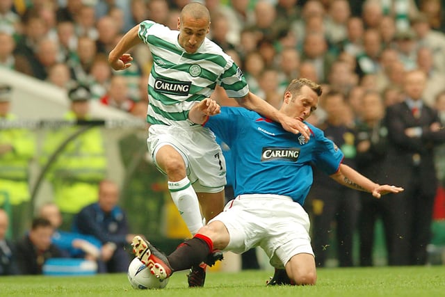 Celtic v Rangers, 1-0, Celtic Park, SPL, 8/5/2004 - Henrik Larsson leaps over rangers Fernando Ricksen