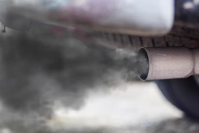 Car belching out exhaust fumes. Only seven percent of Sheffield Council’s vehicle fleet is electric and it might have to charge its own heavily polluting vehicles in its Clean Air Zone.