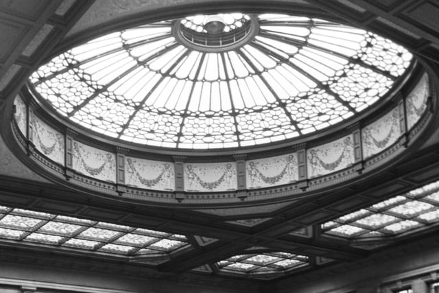 The interior of which famous Edinburgh building boasts this beautiful glass roof?