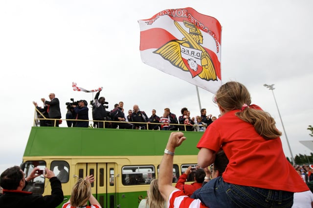 Rovers fans wave off the players on the open top bus