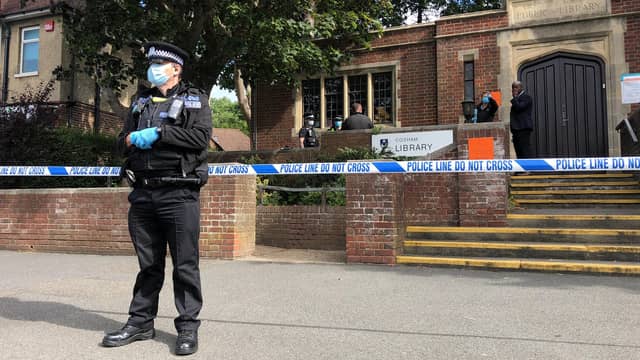 Police in Cosham after an area by the library was cordoned off this morning.