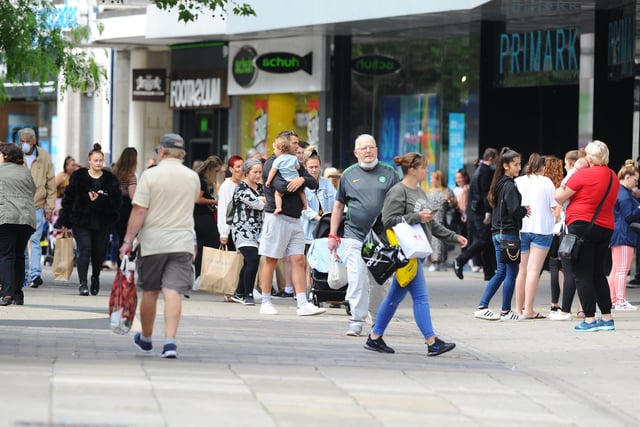 Shoppers flocked to the Cascades Shopping Centre and Commercial Road in Portsmouth as stores reopened. Picture: Sarah Standing (150620-4137)