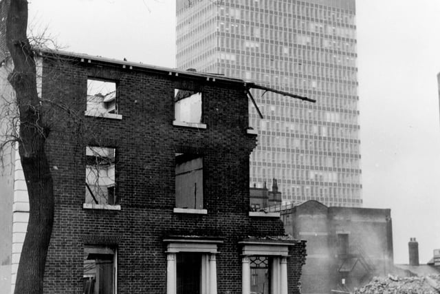 Demolition under way at Weston Terrace, Western Bank, Sheffield, with the University of Sheffield Arts Tower in the background, pictured on March 2, 1966. Ref no: s20433