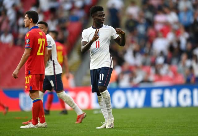 Bukayo Saka of England celebrates after scoring their team's fourth goal during the 2022 FIFA World Cup Qualifier match between England and Andorra at Wembley Stadium on September 05, 2021 in London, England. (Photo by Shaun Botterill/Getty Images)