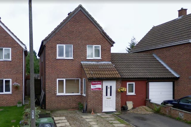 This four-bedroom, link-detached house on High House Avenue, Wymondham, Norfolk, is on the market for £265,000 with William H Brown - close to the average house price in England in November 2020 of £266,742.