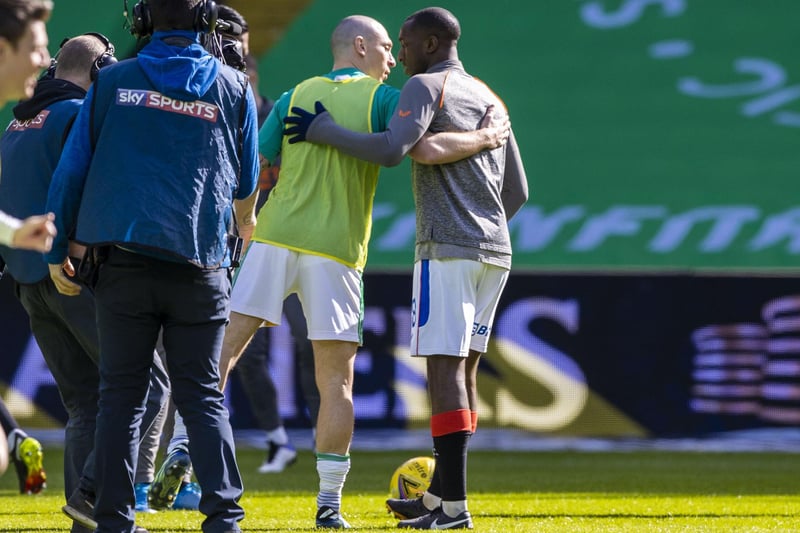 Brown (left) embrace Rangers’ Glen Kamara pre-match during the Old Firm derby between Celtic and Rangers in March 2021 after the Finn had been racially abused during a European match