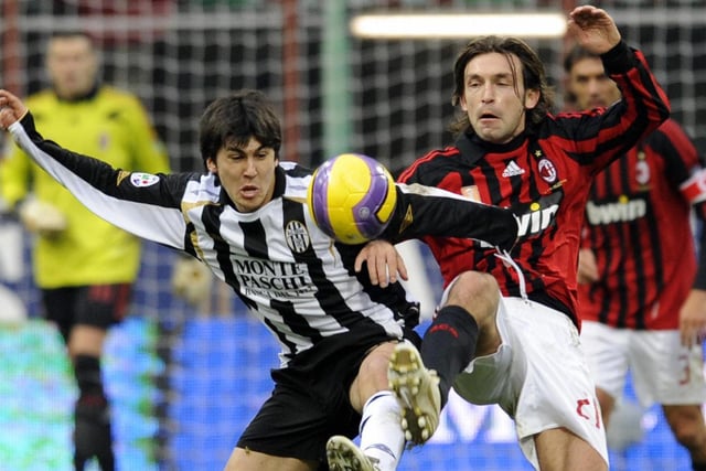 A very young Fernando Forestieri takes on AC Milan midfielder Andrea Pirlo while in Serie A with Siena in 2008. (DAMIEN MEYER/AFP via Getty Images)