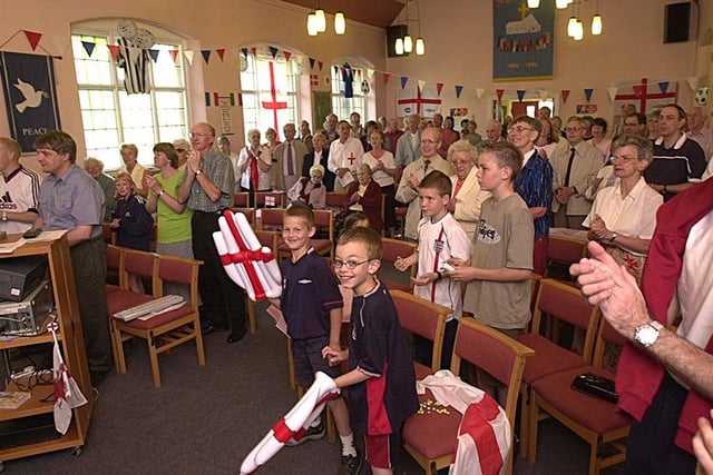 Worshippers at Totley Rise Methodist Church where the Sunday service was brought forward so the congregation could watch the England v Sweden match,  June 2, 2002