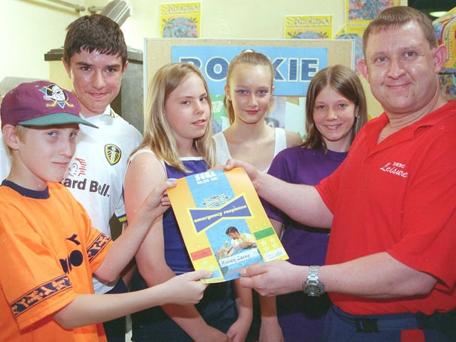 Youngest recepient of the 1999 LIfe Guards award at the St James Swimming Pool ,Watergate Doncaster Kieron Lacey pictured receiving his certificate from Instructor Mick Calver. Looking on are other award winners Matthew Godley,Lauren McMullen,Cassandra Kirby and Sally Hayes.