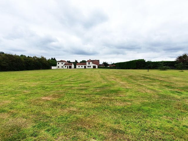 The three properties sit within well maintained gardens which have a range of established bushes and trees, along with a large paddock, that has a selection of fruit trees.