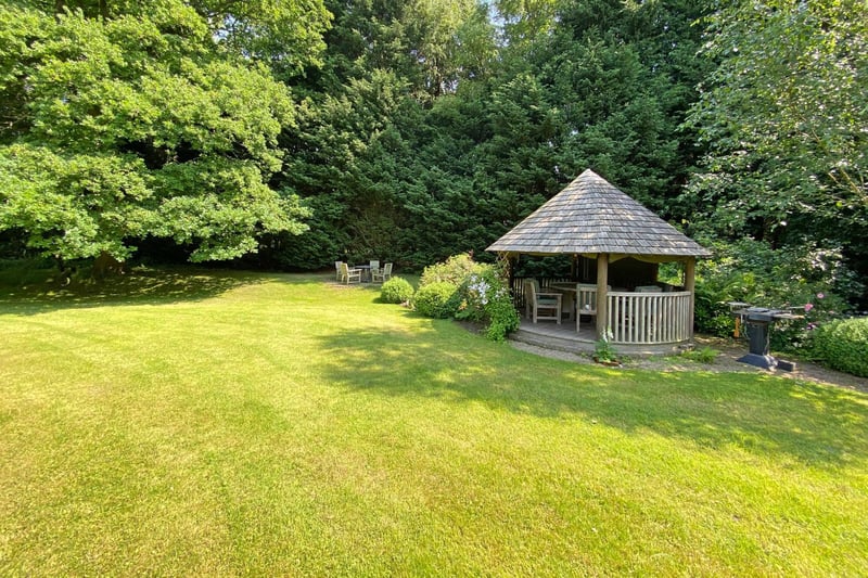 There is a breeze house at the end of the garden, with heating and seating for six to eight people