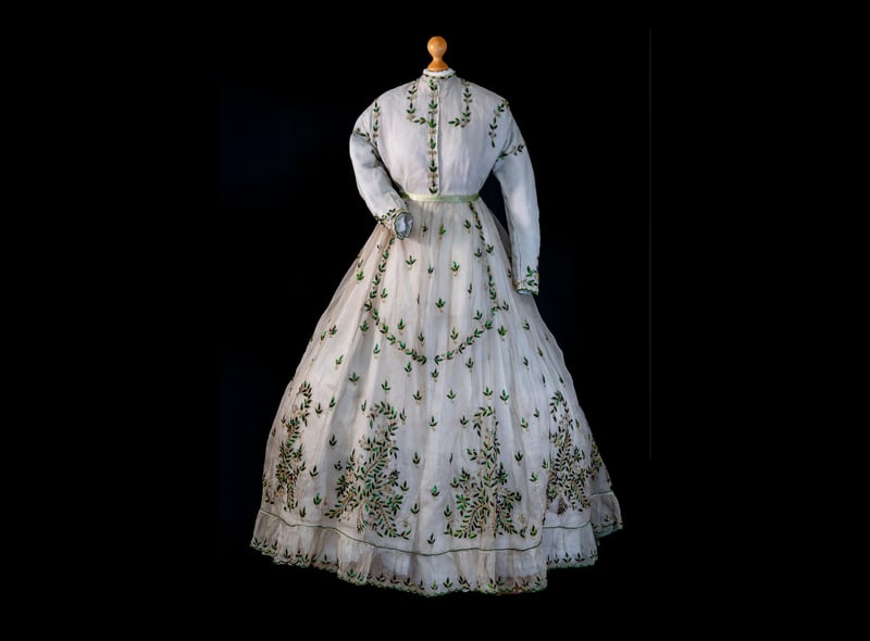 This fine dress speak of emigration, aspiration and Highland links to the Empire. It was made in Madras in 1868 for  Inverness-born Barbara Morrison, the wife of a British Army officer stationed in India. The dress is embellised with silk embroidery and the wings of the jewel beetle.