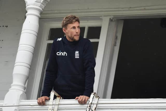 England captain Joe Root look on as rain delays play during day five of the First Test Match between England and India at Trent Bridge.