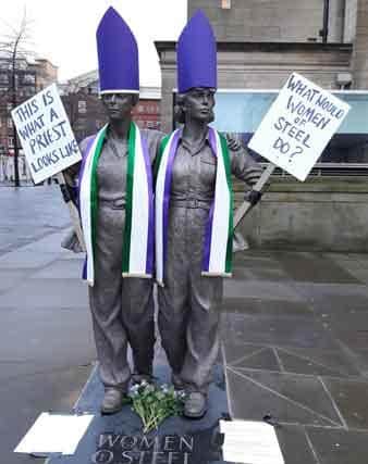 The Women of Steel statues dressed as Bishops on International Women's Day in 2017. A protest ensued against the proposed appointment of Philip North as the new Bishop of Sheffield who opposed the ordination of women.