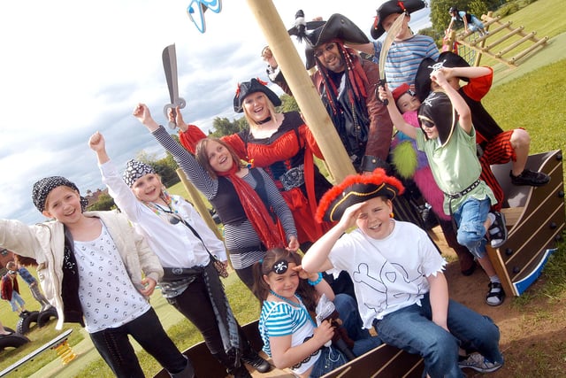 Members of the school council cheer on the opening of King Edwin Primary School's new pirate themed playground in 2009