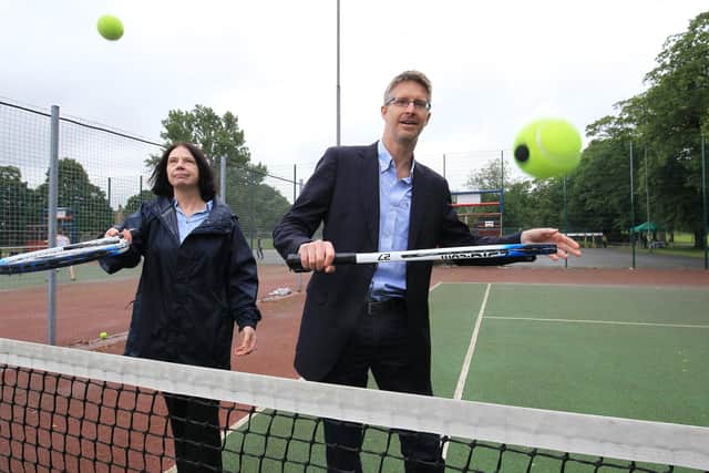 The tennis courts at Hillsborough Park have now reopened. Pictured are Councillor Mary Lea, cabinet member for culture, parks and leisure, with Jeff Hunter from Parks Tennis (photo taken in 2018).