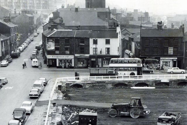 In the foreground is a temporary car park on the site of the old Corn Exchange, Sheffield, October 1963.  The Corn Exchange was severely damaged by fire in 1947 and demolished in 1962