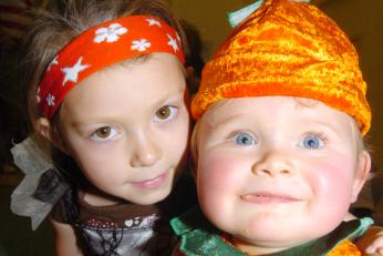 Bethany Burrows aged five from Bell Vue and Jonny Turner, aged 10 months from Hyde Park dressed as a pumpkin. 2007.