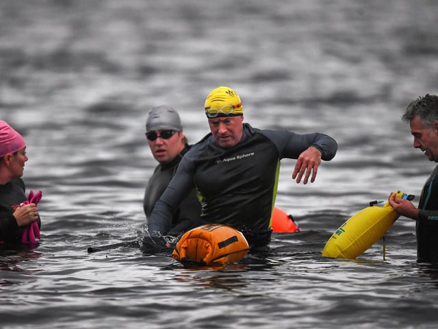 Open water swimming enthusiasts enjoy an early morning swim in Loch Lomond ,Trossachs, Scotland. A new study from the UK Dementia Research Institute found that the blood of regular winter swimmers contains a "cold-shock" protein that wasn't found in that of people who did other cold-weather exercise on dry land. This protein has elsewhere been shown to slow the onset of dementia and even repair damage it causes in mice.