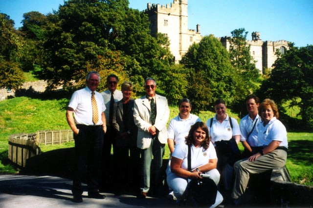 The West Virginians with bakewell Rotarians at Haddon Hall in 2004. 
A party of four West Virginian Group Study Exchange students, under their leader, Ted Williams, recently visited Bakewell. The group were entertained to lunch at the Rutlands Hotel and each one of them gave a thumbnail sketch of their job and background in West Virginia. They were subsequently taken to Haddon Hall in the afternoon.
