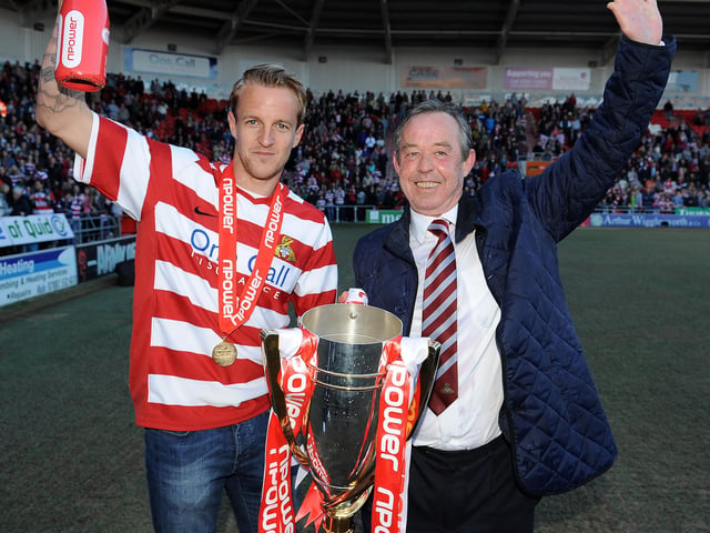 James Coppinger and manager Brian Flynn celebrate promotion