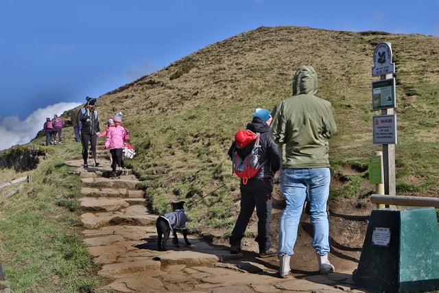 Mam Tor, a three mile circular route on a stone surfaced footpath will reward you with one of the most dramatic viewpoints in the Peak District. There is a carpark.