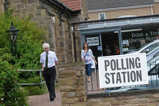 Residents leaving after placing their 2016 EU referendum votes at Dore and Totley United Reform Church