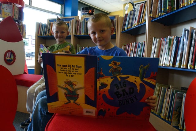 The summer reading club at the school was a big hit with these pupils in 2003.
