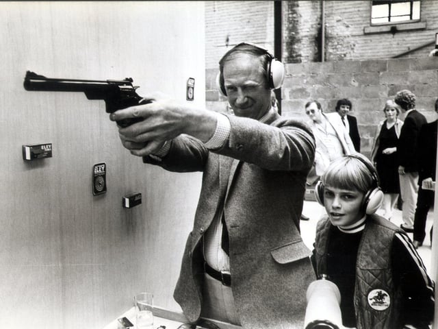 Jack Charlton opens new gun range.
Pic shows Jack in action, with 11 year old Paul Johnson (son of the Managing Director) looking on.
Filed May 13 1982