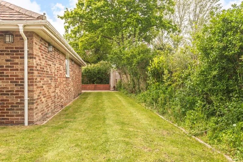 The garden keeps privacy on all sides of the property.