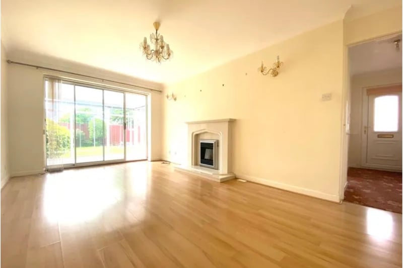 This property boasts plenty of room and light with a large living area that leads to a conservatory.